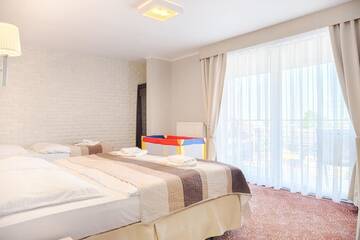 Фото номера Семейный номер с балконом Отель Hotel Messa г. Владыславово 7