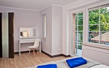 Фото номера Улучшенные апартаменты с 1 спальней Апартаменты Haller House Apartamenty г. Владыславово 6