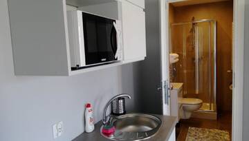 Фото номера Апартаменты с душем Апартаменты Apartamenty na Nadmorskiej г. Владыславово 8