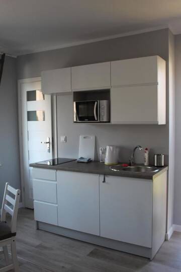 Фото номера Апартаменты с 1 спальней Апартаменты Apartamenty na Nadmorskiej г. Владыславово 6