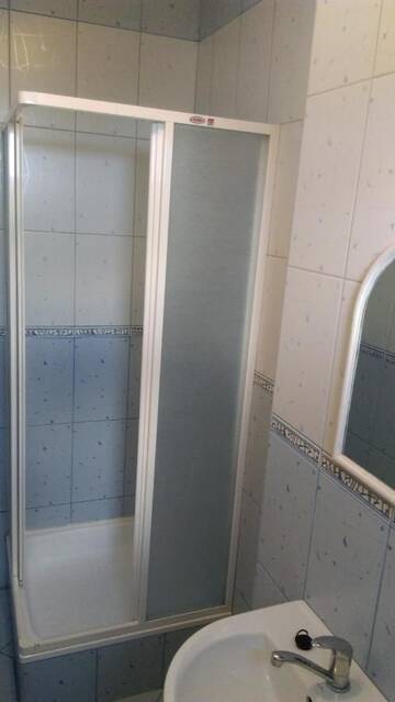 Фото номера Двухместный номер с 1 кроватью и собственной ванной комнатой Проживание в семье Rodzinna Przystań г. Владыславово 4