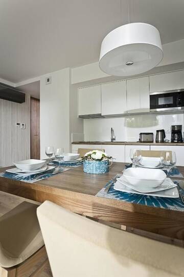 Фото номера Семейные апартаменты с 1 спальней Отель Gwiazda Morza Resort SPA&amp;SPORT г. Владыславово 8
