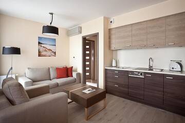 Фото номера Семейные апартаменты с 1 спальней Отель Gwiazda Morza Resort SPA&amp;SPORT г. Владыславово 11