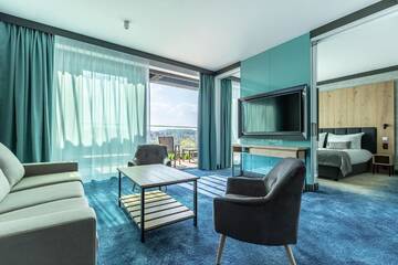Фото номера Улучшенный двухместный номер Делюкс с 1 кроватью Отель Gwiazda Morza Resort SPA&amp;SPORT г. Владыславово 5