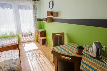 Фото номера Двухместный номер с 2 отдельными кроватями и собственной ванной комнатой Проживание в семье PIKA Pokoje Gościnne г. Владыславово 8